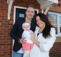 Family move: Mark Adamczyk and Joanna Nugent with Pixie Sophia